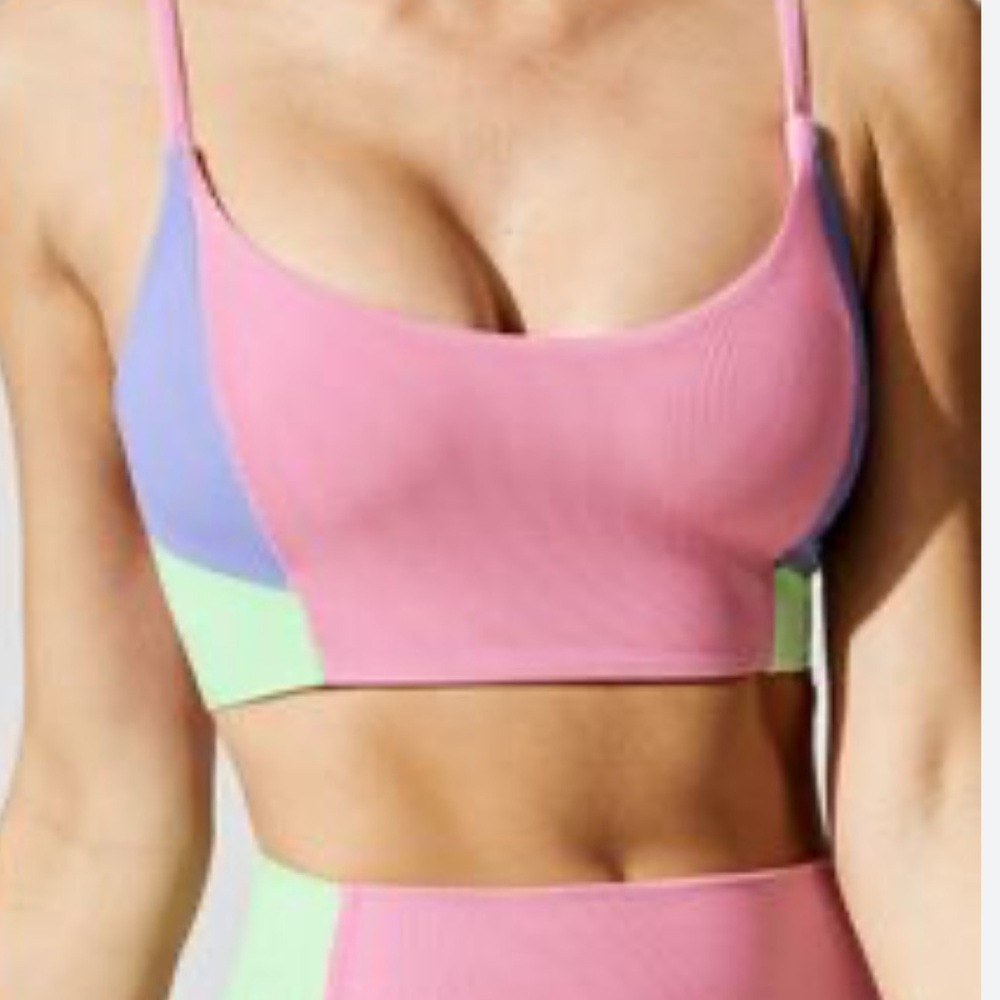 Beach Riot Eva Activewear Top in Colorblock Neon Green Pink and Purple.
